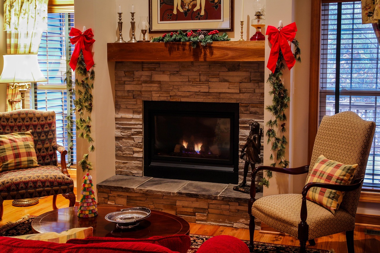fireplace, mantel, living room, cozy, christmas, xmas, chairs, seating, stone fireplace, gas fireplace, hearth, family room, christmas decorations, red bows, pine garland, holiday decorations, coffee table, gumdrops, swag, interior design, brown coffee, brown room, brown table, brown design, brown interior, brown stone, fireplace, fireplace, fireplace, fireplace, fireplace