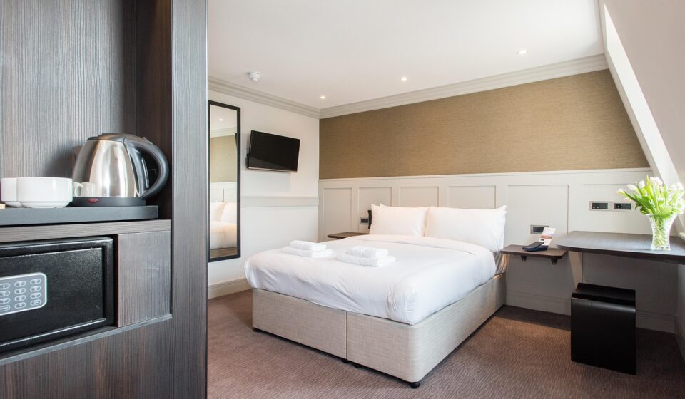 room, hotel room, hotel, bed, furniture, pillows, interior design, bedroom, indoors, bedroom furniture, house, home, minimalist design, minimalist interior, modern apartment, architecture, window, comfortable, contemporary, residential