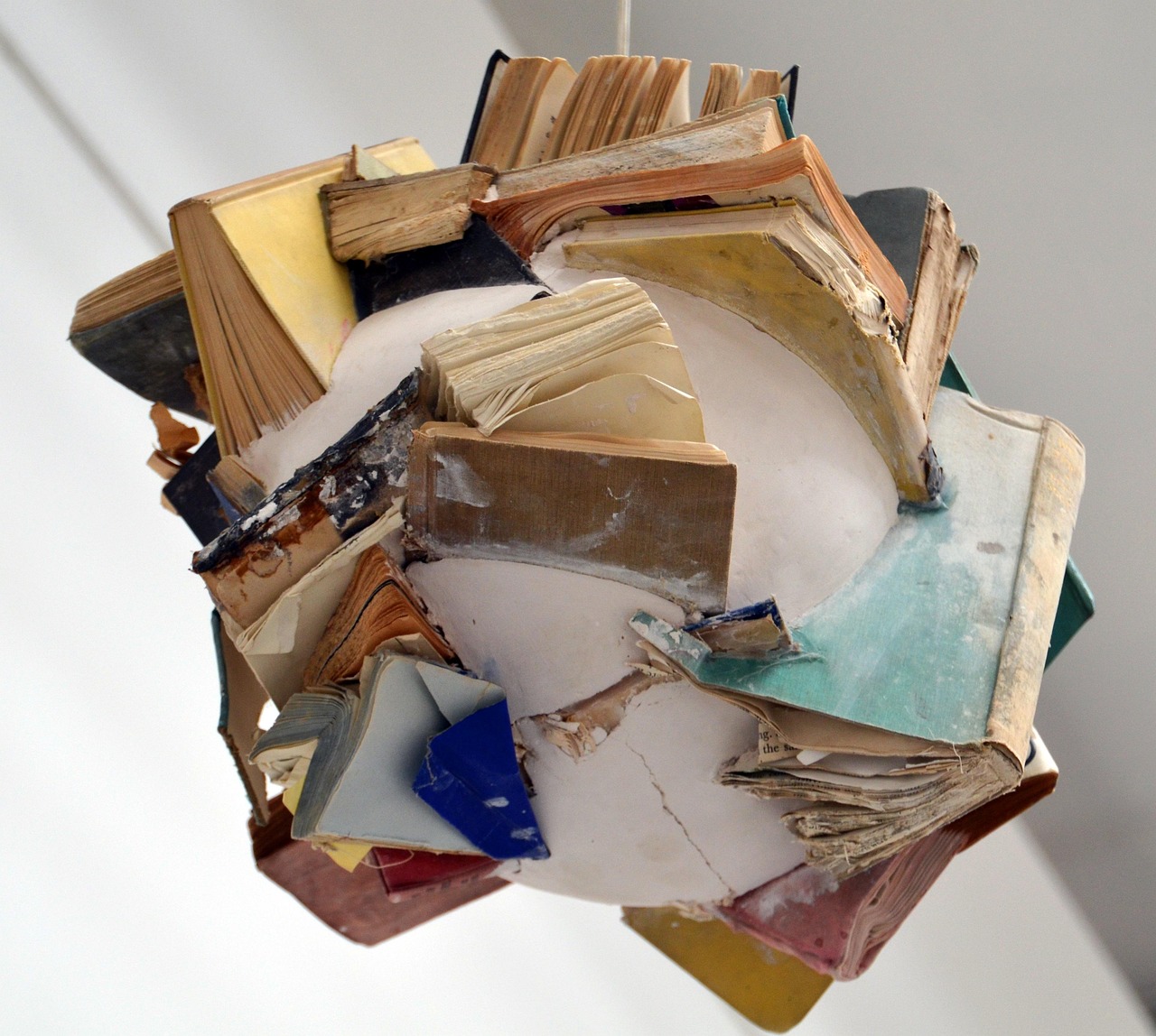 books, mixed up, chaos, a book, art, art installation, installation, biennale, read, to learn, literature