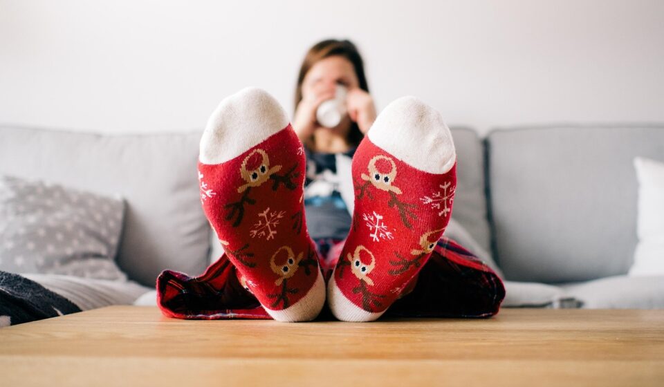 christmas wallpaper, feet, socks, living room, person, relaxing, table, couch, woman, lazy, pajamas, xmas, reindeer, relax, warm, home, sitting, female, human, comfortable, relaxation, cozy